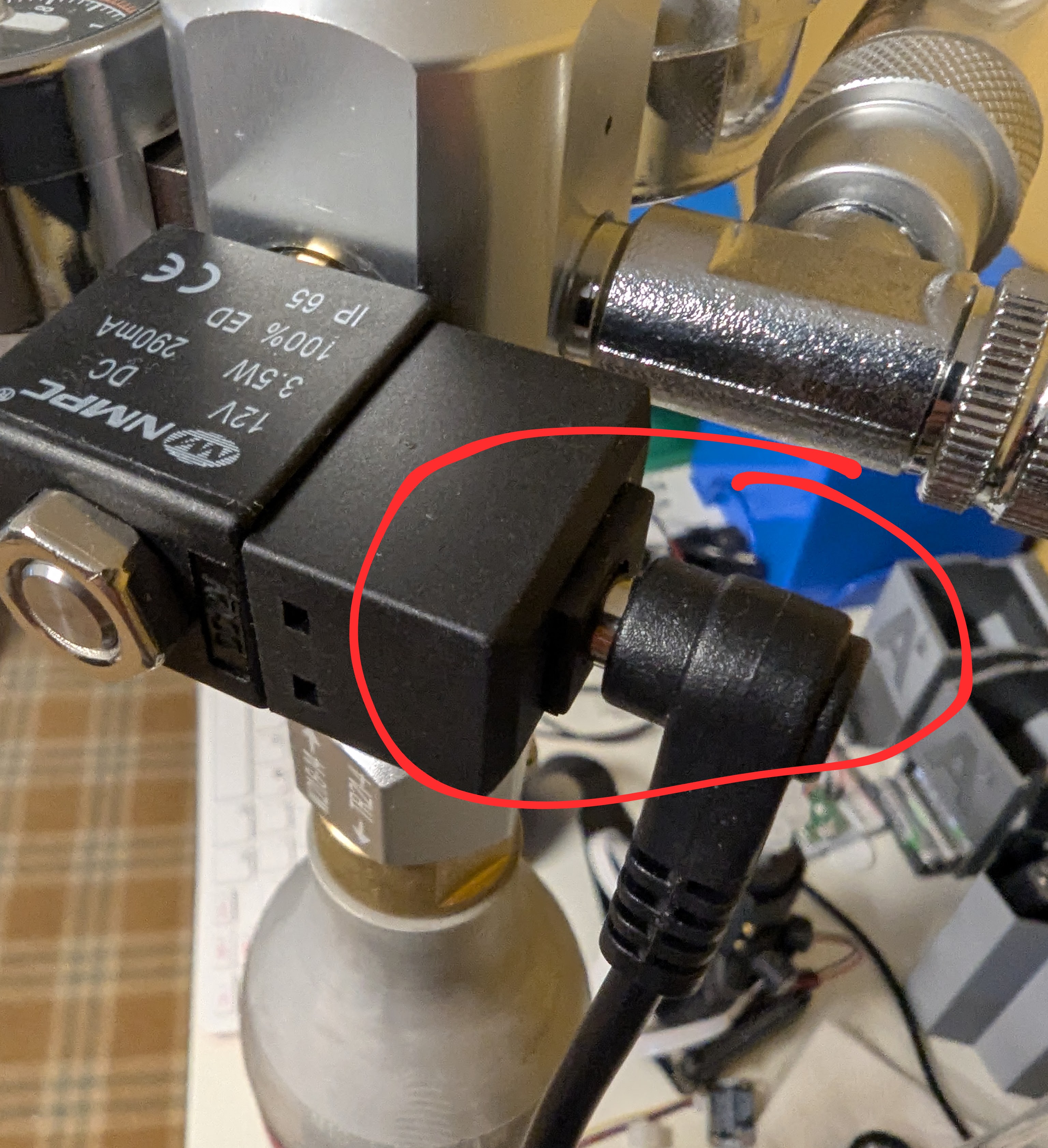 Power cord plugged into solenoid of the regulator